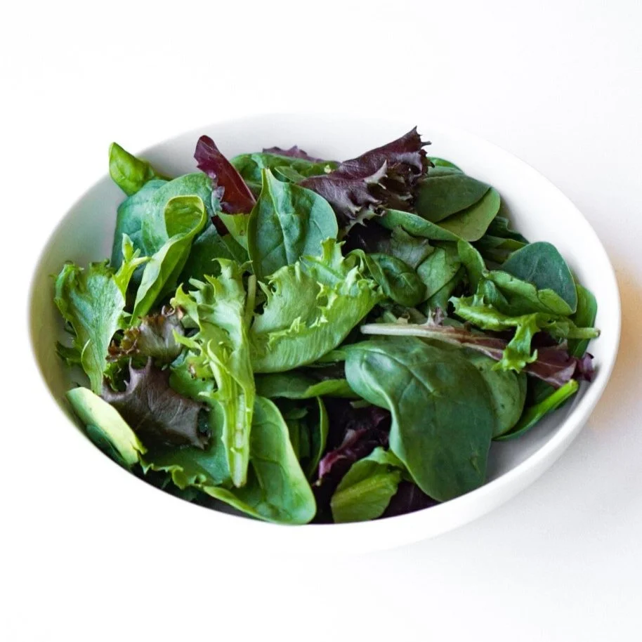 Green leaf lettuce, from above in a white dish