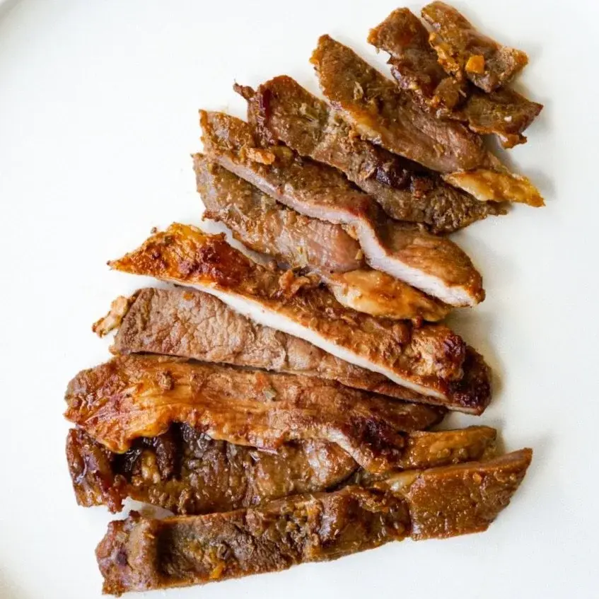 Lemongrass pork, from above in a white dish
