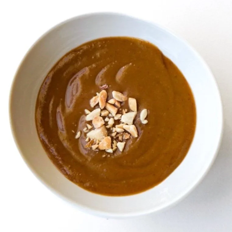 Peanut sauce, from above in a white dish