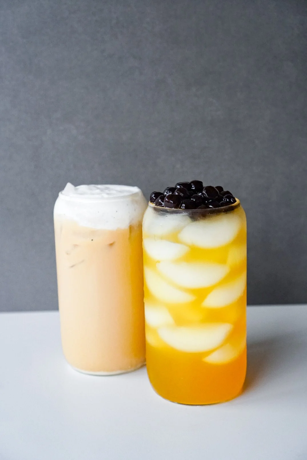 Iced milk tea and fruit tea with boba